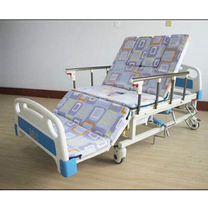 Lit médical manuel Jiaxin avec barrière de sécurité pour les soins à domicile des adultes - Product Image 1