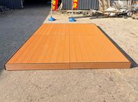 Système de terrasse modulaire en WPC co-extrudé pour l'extérieur, assemblage direct usine, idéal pour les jardins, pelouses, villas, parcs et projets paysagers