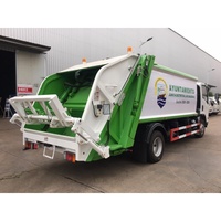 Camion compacteur de déchets Isuzu ELF 4x2, camion à chargement arrière, véhicule de compression des déchets