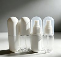 Flacon pulvérisateur capsule de 60 ml en stock, en PET, portable pour voyage, cosmétiques, lotion, crème solaire, parfum, rechargeable.