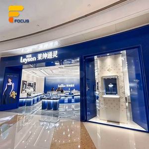 Aménagement de boutique de bijoux de luxe haut de gamme : <span class=keywords><strong>Vitrine</strong></span> en verre bleu avec cadre métallique et comptoir de présentation - Product Image 5