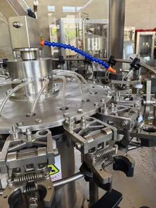 מכונת מילוי אוטומטית לשטיפה נוזלית אוראלית בקבוקי קופסאות חשמליות עם מצב חדש לרכיבי ליבת שמן מים כלול