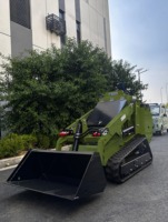 Mini Skid Steer Loader Beban Terukur 410kg Beban Maksimum 525kg Kapasitas Ember 0.15m3 Tinggi Pemuatan 2230mm Loader dengan Track Karet