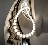 Lustre LED ovale long moderne et minimaliste personnalisé, luminaire suspendu de luxe à intensité variable et hauteur réglable pour hall d'hôtel et salon
