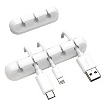 Support organisateur de câbles en silicone à 3 fentes, noir, durable, pour câbles, usage domestique ou au bureau