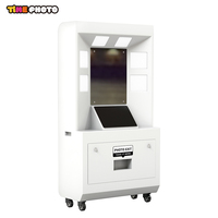 Kiosque photo instantané à monnayeur avec imprimante, écran tactile et armoire éclairée sur roulettes pour lieux de divertissement