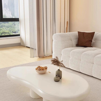 Table basse minimaliste et tendance 'Cloud' de style scandinave, luxe léger, forme unique, style Wabi-Sabi pour salon, chambre et maison