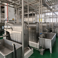 Ligne de production automatique de lait de soja Kangdeli avec système de cuisson à micro-pression et de séparation par broyage céramique