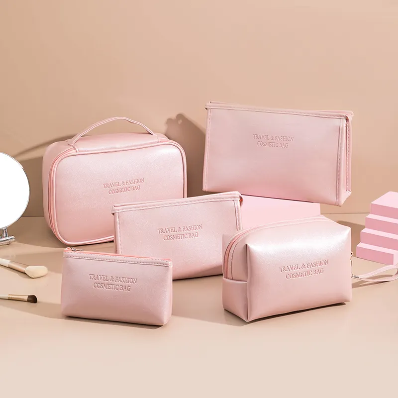 Bolsas de cosméticos de maquillaje de viaje de cuero vegano bolsa de maquillaje pequeña belleza Rosa OEM ODM nueva dama de honor Pu bolsa con cremallera para cosméticos