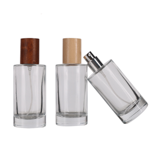 Luxury 50ml Cylinder Round Wooden Cap <strong>Purfum</strong> Spray <strong>Bottle</strong> 50 ml Empty Glass Perfume <strong>Bottle</strong> - Product Image 1