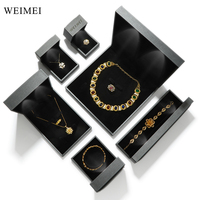 WEIMEI Vente en gros Boîte à bijoux lumineuse en cuir PU avec éclairage LED pour bracelets, boucles d'oreilles, bagues et pendentifs gris, boîte cadeau lumineuse