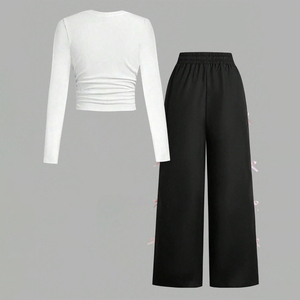 Ensemble décontracté 2 pièces pour adolescentes : Haut blanc à manches longues imprimé lettres et pantalon large noir à nœud latéral – Tenue pour enfants OEM ODM - Product Image 2