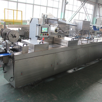 Machine d'emballage sous blister Leadworld, thermoformage, pompe à vide, pour la fermeture des barquettes alimentaires, certifiée CE, utilisation en restauration