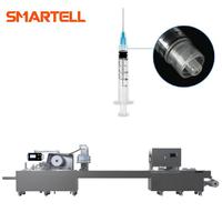 Machine d'emballage automatique électrique Smartell pour kits de perfusion à seringue jetable, contrôlée par PLC, moteur haute productivité, souple