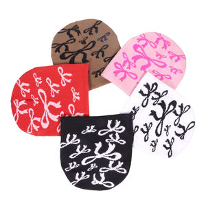 Cappelli coreani senza polsino in maglia Beanie Jacquard alla moda con fiocchi sport freddi di personalità di strada - Product Image 1