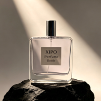 Bouteille de parfum vide en verre transparent de 100 ml avec étiquette personnalisée, paroi épaisse, épaule plate, forme rectangulaire carrée