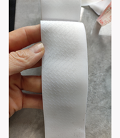 Brassard de cyclisme blanc avec poignée croisée en silicone antidérapante et bande élastique en sangle