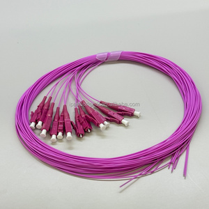 Pigtail de Fibra Óptica OM4 Magenta LSZH de Alta Precisión y Baja Pérdida, Conector LC UPC para Empalme en Gabinete ODF - Product Image 2