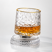 Verres à whisky en cristal rotatifs en gros, 8 motifs disponibles, design avec support métallique, parfaits pour les cadeaux et l'utilisation en bar.