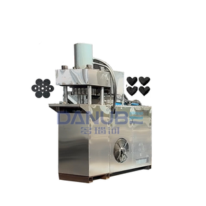 Machine de fabrication de briquettes de charbon de bois en forme de nid d'abeille à partir de coco électrique et de sciure de bois - En promotion - Product Image 1