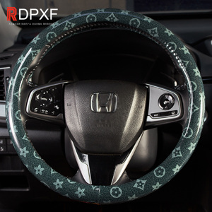 Nuovo modello antiscivolo che assorbe il sudore Versatile per tutte le stagioni di lussuosa copertura del volante per auto - Product Image 3