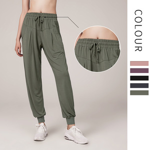 Pantalones deportivos de algodón elásticos de secado rápido con cintura elástica y corte de bota, holgados y adelgazantes, para mujer, con bolsillos, ideales para correr y fitness, de Ningbo <span class=keywords><strong>Dashu</strong></span>. - Product Image 1