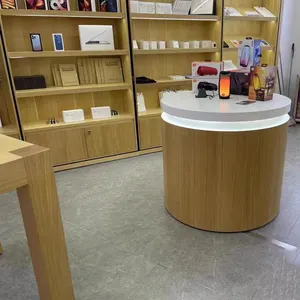 Mesa de exhibición de madera personalizada de fábrica, escritorio de tienda de teléfono móvil, stand de exhibición de diseño de cabina de teléfono móvil
