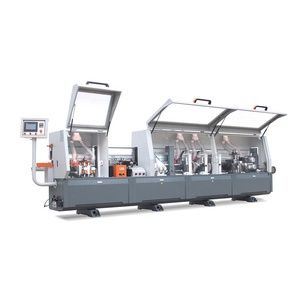 Machine à plaquer les chants avec pré-fraisage et rainurage pour machine à bois de traitement de meubles de type panneau de mélamine - Product Image 1