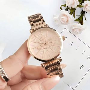 Nuevos relojes de pulsera de China con caja redonda dorada, diseño de Saturno, esfera con efecto rayos de sol, brazalete de metal, relojes de lujo para mujer. - Product Image 4