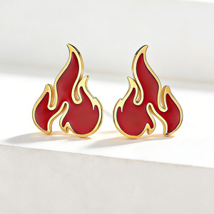 Boucles d'oreilles flamme de torche au style urbain unique, design de niche en acier titane, style chinois tendance, col - Product Image 1
