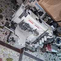 Machine à coudre interlock Pegasus W200 d'occasion, modèle 2015, 7500 max. Vitesse de couture 13 mm, hauteur du pied presseur 250 W, puissance du moteur optimale