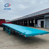 Semi-remorque à plateau plat de 40 pieds, 3 essieux, 60 tonnes, remorque de transport de conteneurs à trois essieux pour la logistique de fret en terminal portuaire