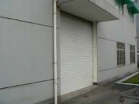 Porte de volet roulant en aluminium isolant étanche Porte de chambre préfabriquée pour entrepôts