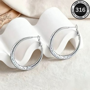 Pendientes grandes retro tallados con motivos étnicos, de acero de titanio, dorados, con relieve circular, que no se desvanecen, para mujer - Product Image 6