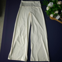 Ensemble deux pièces imprimé pois de créateur, haut à manches longues et épaules dénudées, pantalon évasé à jambes larges contrastant, tailles XS-XL, prêt à expédier