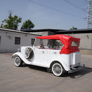 Coche Turístico Eléctrico Retro Blanco con Toldo Rojo para Uso en Villas y Transporte en Atracciones Turísticas - Product Image 1