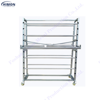 Stand libre Commercial avec couteau coupé 10 rouleaux de tapis Textile rouleaux de tissu présentoir