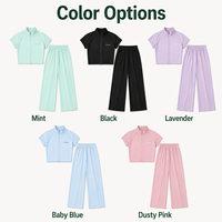 Op maat gemaakte dames cropped zip short sleeve 2-delige set zachte gebreide wijde pijpen broek OEM ODM privélabel voor zomer dagelijkse buitenactiviteiten