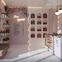 Aménagement intérieur de boulangerie, pâtisserie, café : présentoirs, mobilier, personnalisation complète de la pièce, vitrine en verre, décoration de café.