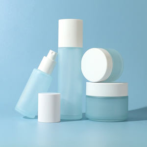 Ensemble de flacons et de pots de conditionnement de lotion pour soins de la peau en verre transparent écologique personnalisé - Product Image 1