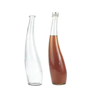 Unique Shape Glass Beverage Bottle 550ml Custom Clear Spirit Liquor Vodka Whiskey Wine Bottle With Cork Manufacturer