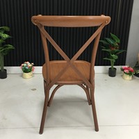 Chaise à dossier croisé en métal couleur grain de bois pour événements et mariages, en promotion