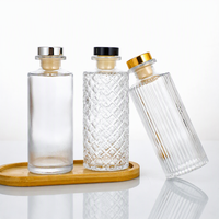 Bouteille diffuseur d'aromathérapie cylindrique de luxe 150 ml avec bouchon à vis en liège, estampage à chaud, vente directe d'usine, flacon de parfum en verre