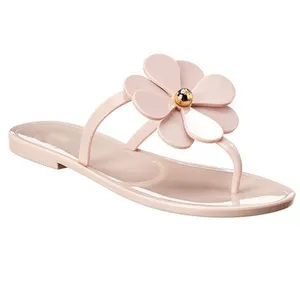 Sandale pour dames personnalisée avec string en gelée de fleurs pour l'extérieur en PVC vente en gros de luxe tongs avec fleurs scintillantes chaussures pour femmes pantoufle