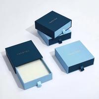 Boîtes cadeaux en carton écologiques colorées |   Emballage haut de gamme pour bijoux et montres avec système de tirage à languette