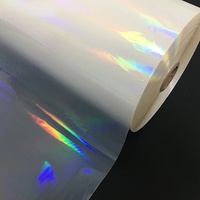 Film de laminage thermique à chaud en rouleau, holographique transparent 3D, PET Bopp, gaufrage doux au toucher, 330 mm * 200 m * 25 microns