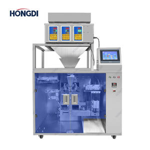 Machine de remplissage et d'emballage automatique à trois têtes haute efficacité pour granulés et sachets plastiques préformés, avec moteur, pour aliments et snacks (facile à utiliser) - Product Image 1