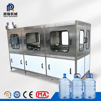 Machine de remplissage d'eau monobloc compacte 100 BPH pour bidons de 5 gallons, unité tout-en-un de rinçage, remplissage et bouchage pour l'industrie de l'eau