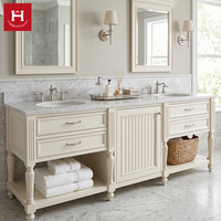 Meuble-lavabo double vasque en bois massif blanc Happy Houses avec tiroirs, étagère ouverte, quincaillerie argentée et plateau en marbre