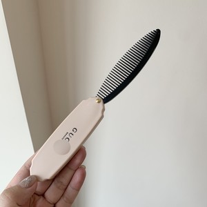 Peigne pliant vintage français en plastique, élégant et polyvalent, plus de 20 cm, rose, idéal pour les cadeaux - Product Image 1